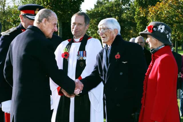 The Duke of Edinburgh greets Dr Sandy Saunders at the unveiling ceremony for a new memorial to the iconic Guinea Pig Club at the National Memorial Arboretum EMN-160911-111403001