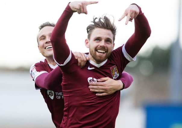 Paul Anderson celebrates his fifth goal of the season for Northampton EMN-160911-114422002