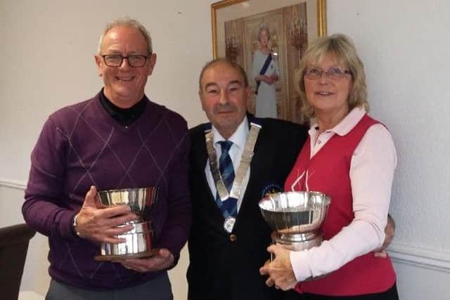 Ian Solloway (left) and Denise Waldron claimed county silverware for Melton Golf Club EMN-161115-171848002