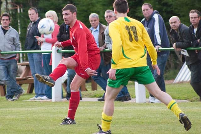 Action from the 2009/10 Melton Charity Cup final when Melton Mowbray beat Holwell on a penalty shoot-out PHOTO: Jim Harrison EMN-161116-102904002
