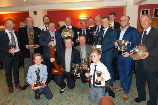 Mens prize winners including Race to Woodhall Spa champion David Poolan (kneeling, second left) and Player of the Year Billy Kevan (kneeling, second right). Also kneeling are junior winners Ed Gough (left) and Louis Woodcock EMN-161122-114449002