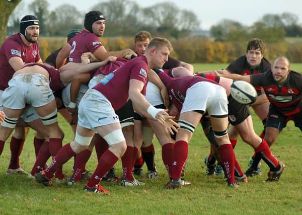 Lee Miller gets the ball away for Melton in their 39-7 win over Dronfield EMN-161122-102437002