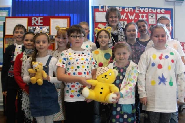 St Francis Catholic Primary School held an 'own clothes' day and raised Â£235. 41 for BBC Children in Need PHOTO: Supplied