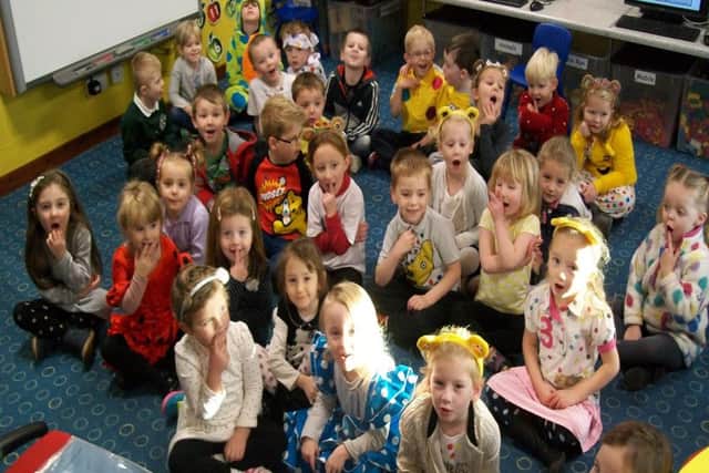 The children and staff of St Marys Primary School raised an incredible Â£450 for Children in Need by selling delicious home-baked cakes and holding a non-school uniform day. Everyone contributed Â£1 to wear spotty themed dress PHOTO: Supplied