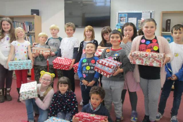 Pupils at St Peter's Primary School in Wymondham wore spots and took part in a obstacle course. As well as supporting Children in Need the children also brought in shoeboxes for the Operation Christmas Child campaign which sends the boxes filled with gifts around the world PHOTO: Supplied