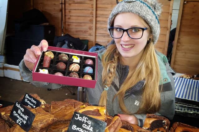 Amy Lewis shows off some goodies from Jack Lewis chocolates PHOTO: Tim Williams