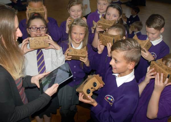 Sherard teacher Rachael Pooler with year five pupils in their virtual reality experience class PHOTO: Tim Williams