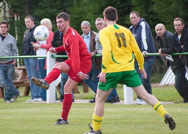 Action from the 2009/10 Melton Charity Cup final when Melton Mowbray beat Holwell on a penalty shoot-out PHOTO: Jim Harrison