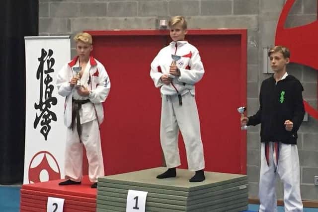 Callum Breward stands on the top step at the Belgium Youth Championships EMN-161124-085618002