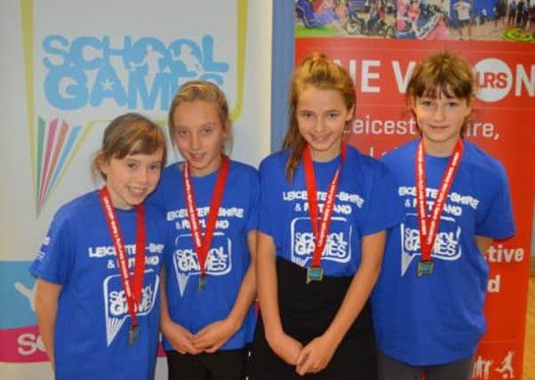 Bottesford girls' team proudly wear their silver medals EMN-161125-115713002