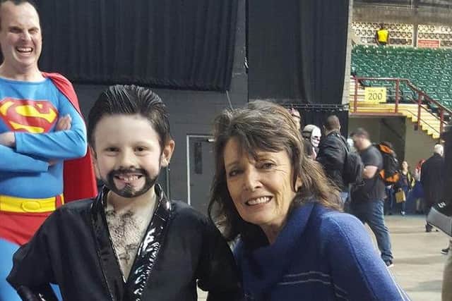 Sam Pick in his award-winning Superman costume meets Sarah Douglas, an actor from the early movies about the superhero EMN-161129-112814001