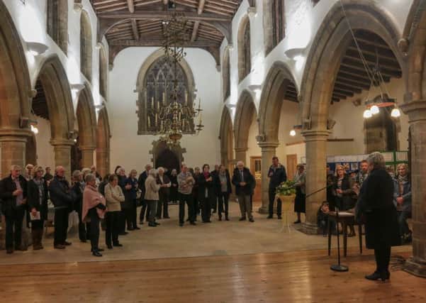 Villagers and church members gather at the opening ceremony for the renovated St Mary Magdalene Church at Waltham EMN-161129-093848001
