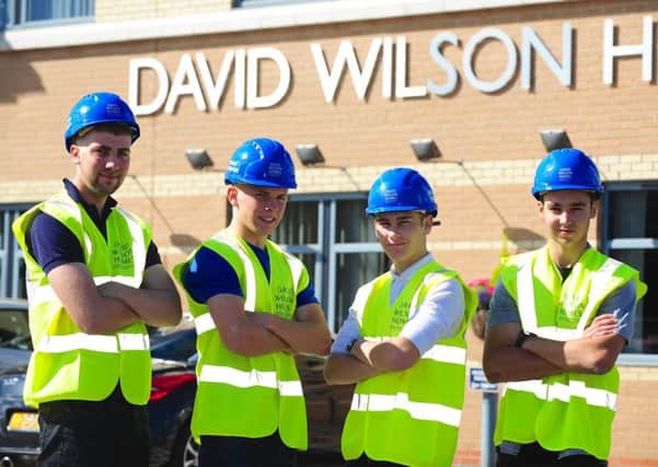 William Woolhouse (second from left) is one of four undertaking an apprenticeship with David WIlson Homes East Midlands.