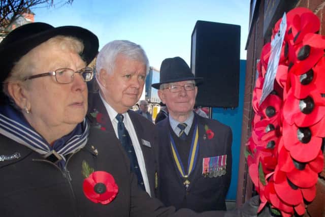 Wreath layers Pat Wilson, Frederick Thompson and Peter Roffey outside the Royal British Legion HQ in Melton during the Armistice Day service EMN-161128-104813001