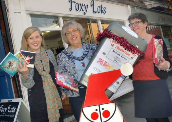 Foxy Lots : Owner Kim Baker with daughter Bethany and former Cards for Good Causes organiser Dinah Hickling. EMN-161128-125946001