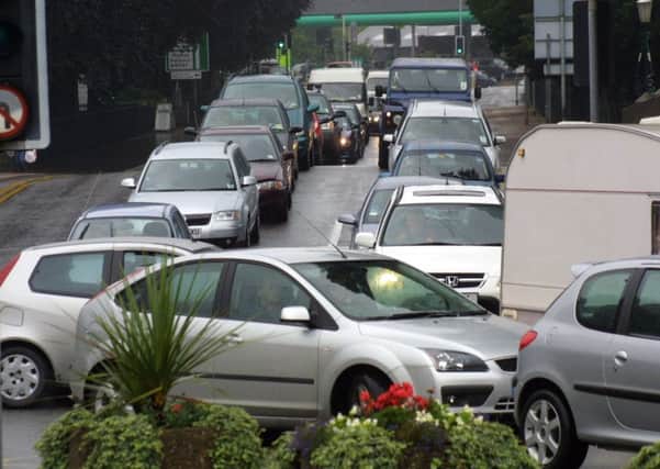 The all too familiar sight of traffic clogging up the A607 Leicester Road entrance to Melton EMN-161129-123055001