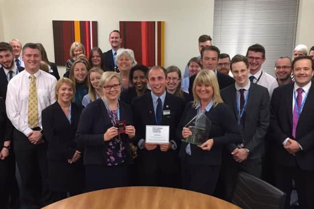 The Melton building society celebrates success at a special staff gathering.