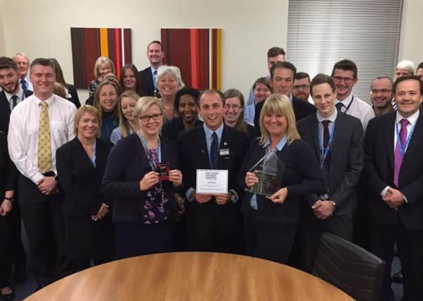 The Melton building society celebrates success at a special staff gathering.