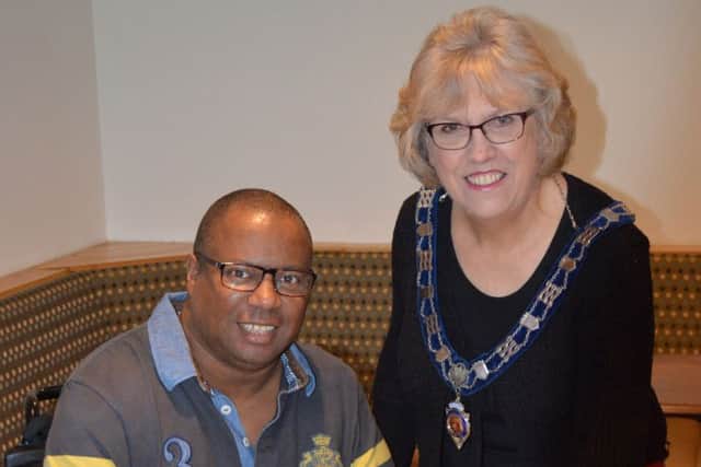 Asfordby FC chairman Andy Harrison with Melton Mowbray Town Estate senior townwarden Dinah Hickling EMN-161130-122155002