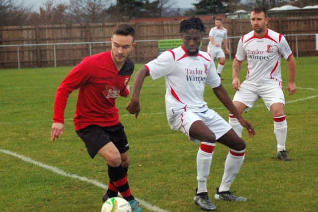 Tom Byrne on the ball for Melton Town EMN-160712-094755002