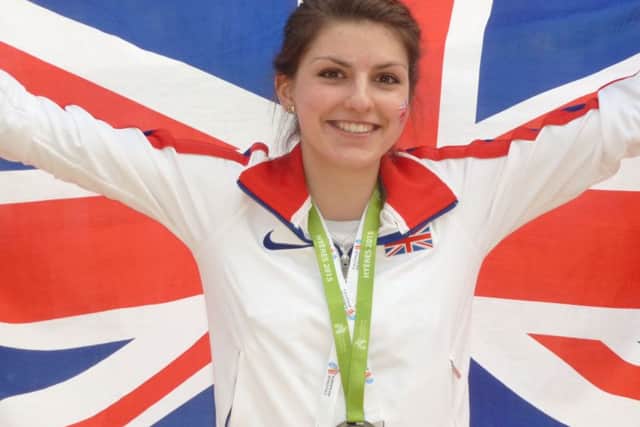 Frisby athlete Mari Smith celebrates winning a team silver medal for Great Britain at the European Cross Country Championships at Toulon EMN-160212-131140002