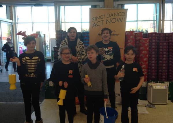 Stagecoach students raised Â£230 for charity by singing Christmas numbers at Melton's Sainsbury's store PHOTO: Supplied