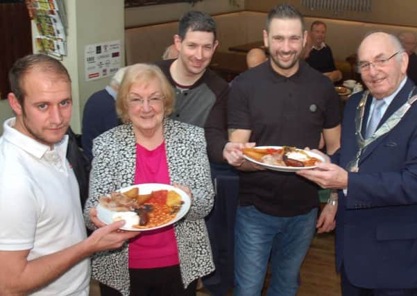 The Veterans' Breakfast support group is held at The Harboro Hotel in Melton - Danny O'Brien and Darren Tilson get their full English from Councillors Pam Posnett, Simon Lumley and Mayor David Wright EMN-160512-114104001
