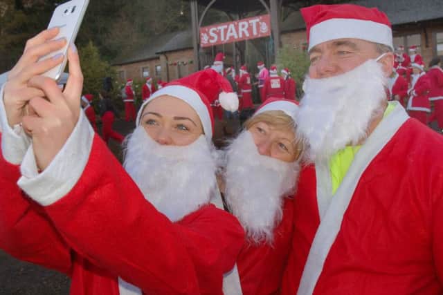 Time for that Santa selfie for the Davies family PHOTO: Tim Williams