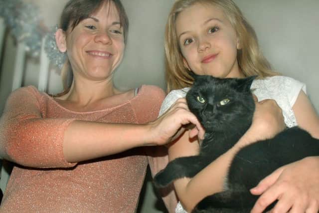A relieved Lucy and daughter Kera clutching Jessie PHOTO: Tim Williams
