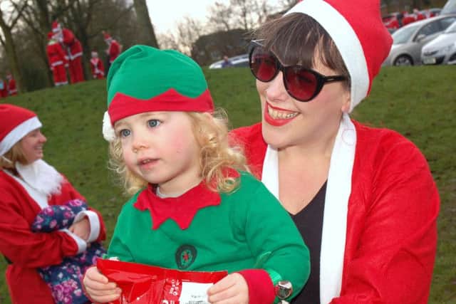 The cutest elf Huey Merrison with proud mum Lora PHOTO: Tim Williams