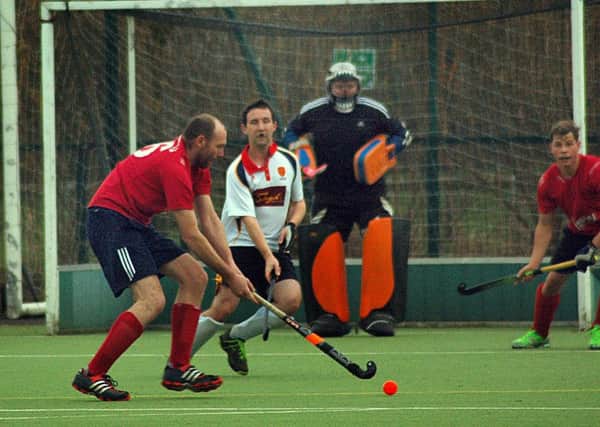 John Judge lines up a pass for Melton HC First XI against Nottingham EMN-161213-101635002
