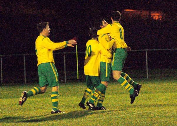 Holwell celebrate their early opening goal EMN-161214-110810002