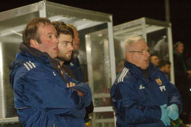 Cliff Thornton, Phil Baker stand in for manager Tony Thorpe at the start of the match EMN-161214-150647002