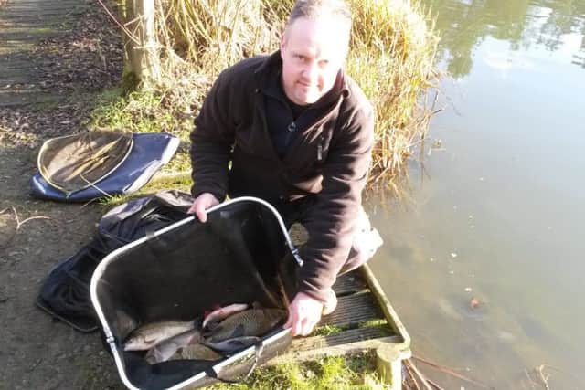 Danny Tarret with his Boxing Day winning net EMN-161227-114720002
