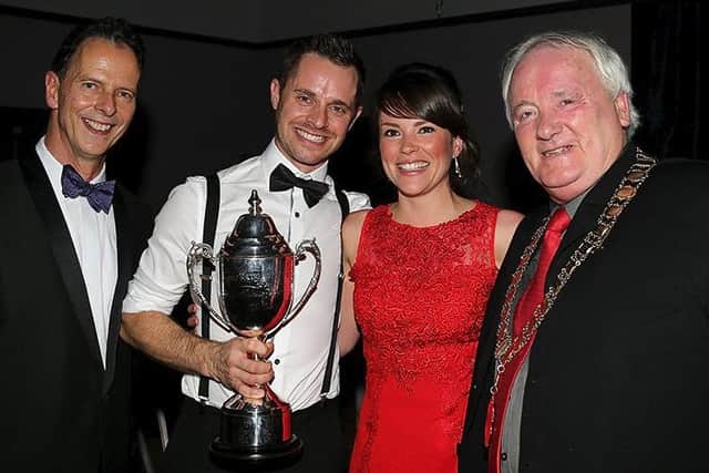 Hart receives the Classic Racer of the Year award with his fianc?e Laura EMN-161227-142743002