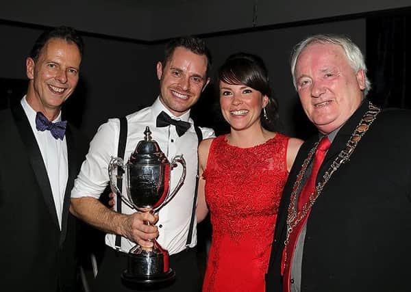 Hart receives the Classic Racer of the Year award with his fianc?e Laura EMN-161227-142743002
