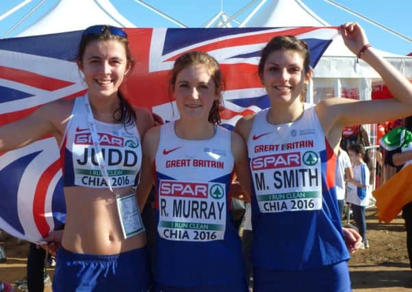 Mari Smith shows off her European gold medal with team-mates Jess Judd and Rebecca Murray EMN-161227-124538002