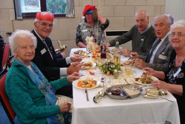 Guests enjoy their Christmas Day lunch at Melton Mowbray Baptist Church PHOTO: Supplied