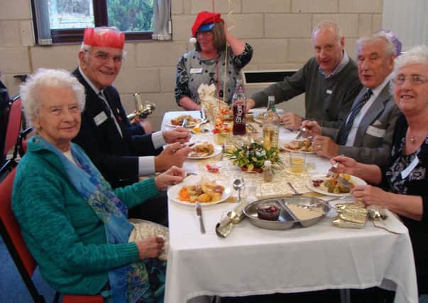 Guests enjoy their Christmas Day lunch at Melton Mowbray Baptist Church PHOTO: Supplied