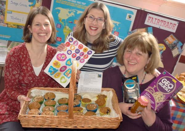 Fairtrade steering group members Polly Swann, Lynn Marriott and Helen Chadwick make their breakfast selections EMN-170301-143303001