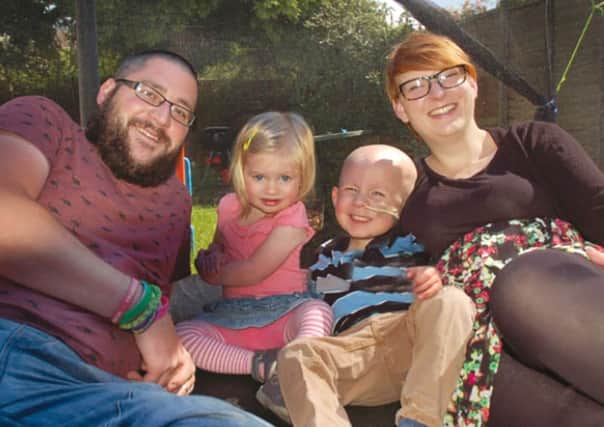 Oscar Dustan, 6, of Asfordby, is the face of a CLIC Sargent campaign. He is pictured with his family
