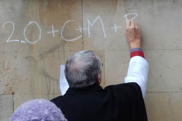 St Mary's Church, Melton, is blessed with a 'chalking of the doors ceremony' EMN-170901-122252001