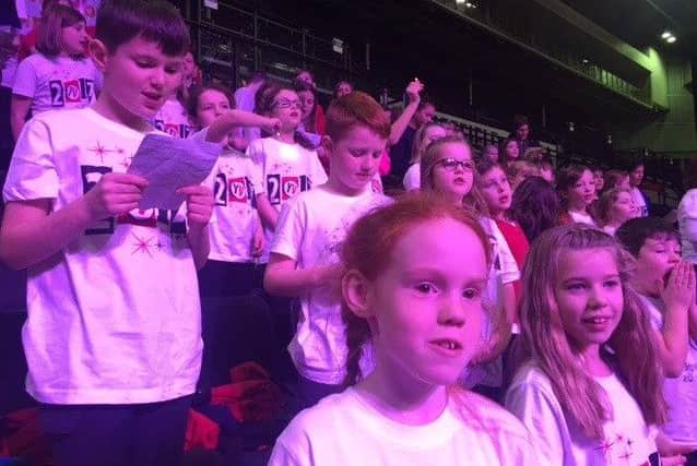 Pupils from Asfordby Captain's Close Primary School perform in the Young Voices concert PHOTO: Supplied