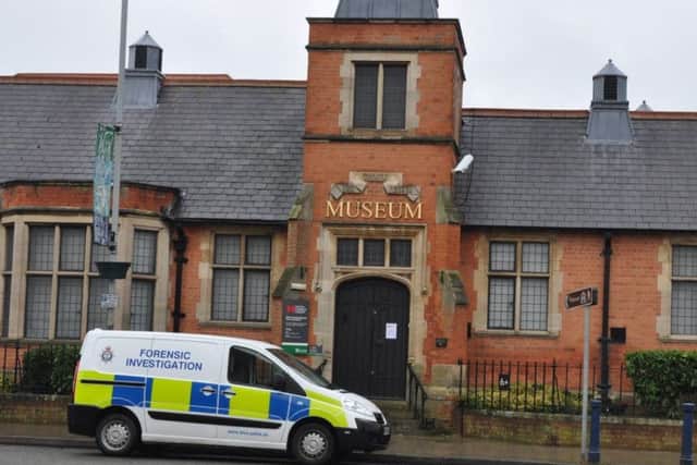 A police van parked outside Melton Carnegie Museum following an attempted break-in EMN-170116-131833001