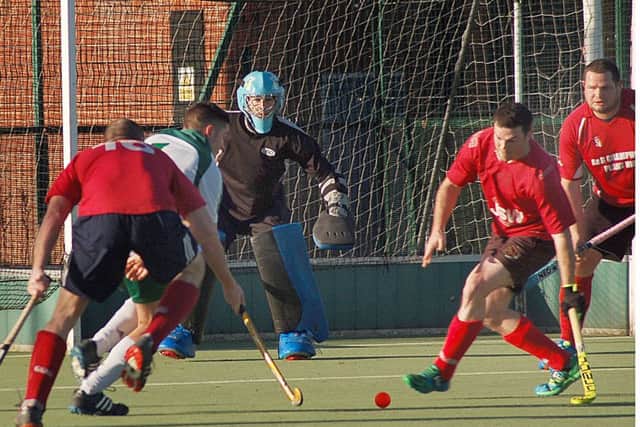 Chris Foode and Pete Taylor defend Melton's goal EMN-170117-113005002