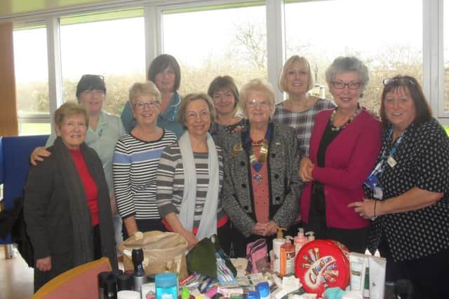 Members of The Inner Wheel Club of Melton Mowbray Belvoir hand over their donated toiletries to staff at Melton Hospital PHOTO: Supplied