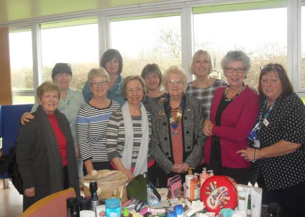 Members of The Inner Wheel Club of Melton Mowbray Belvoir hand over their donated toiletries to staff at Melton Hospital PHOTO: Supplied