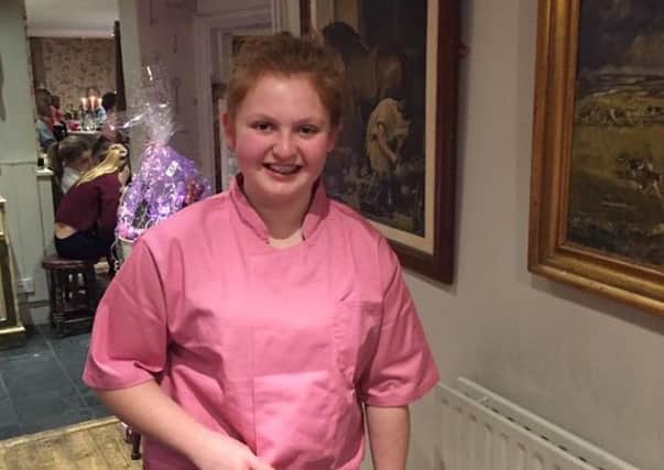 Lucy Towle in her pink chef's uniform PHOTO: Supplied
