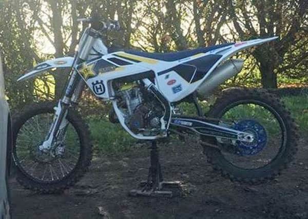 A Husqvarna motorcycle stolen from a garage in Bottesford by intruders EMN-170123-101948001
