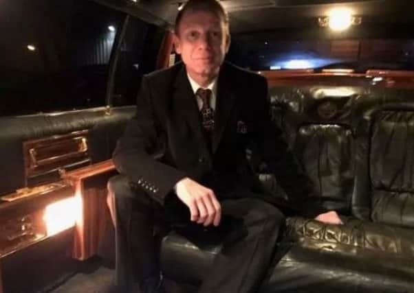 Harlaxton man Gareth Bowles sitting in the Cadillac designed by Donald Trump PHOTO: Supplied